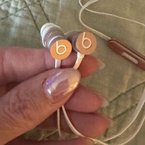 Beats by Dre . wired ear buds! Used only once! Rose gold! Great sound!
